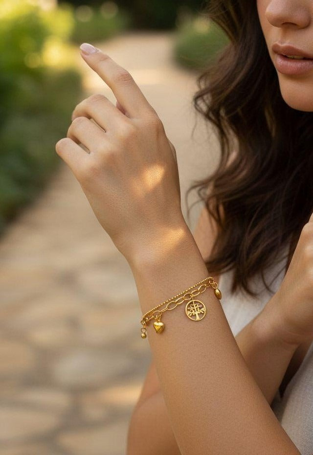 BRACELET EN ACIER COEURS ET ARBRE DE VIE PENDANTS