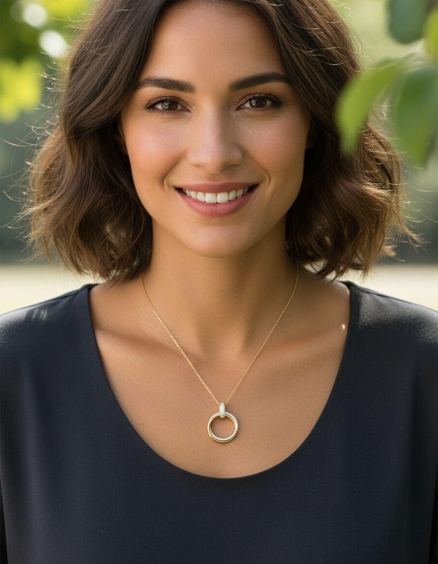 COLLIER EN ACIER DORE 2 CERCLES AVEC STRASS