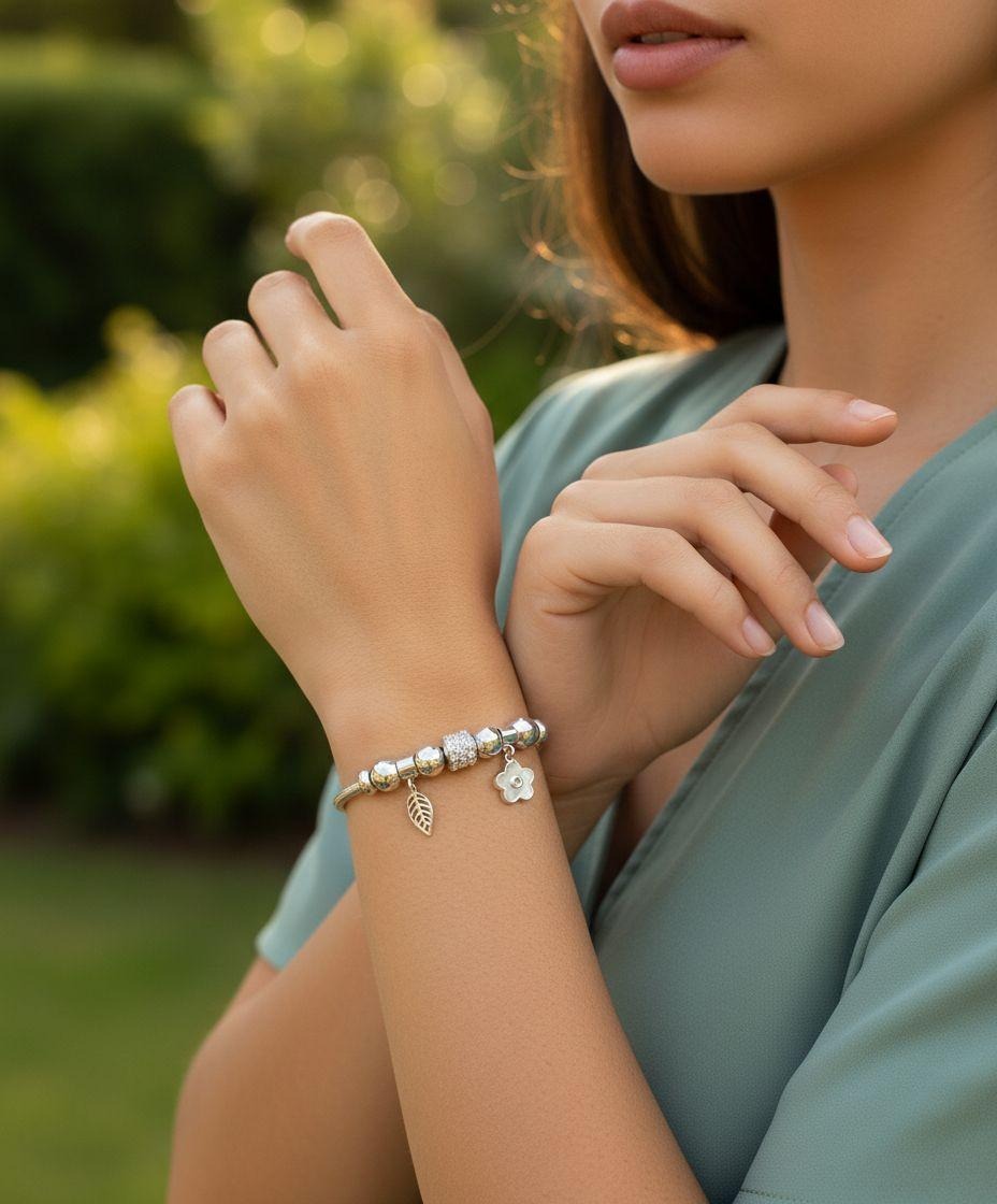 BRACELET EN ACIER AVEC FLEUR ET FEUILLE