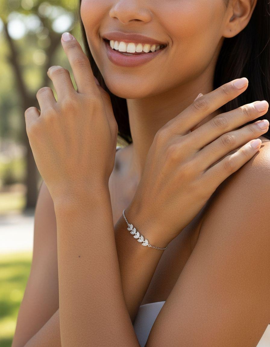 BRACELET EN ARGENT MOTIF FEUILLE AVEC PIERRES