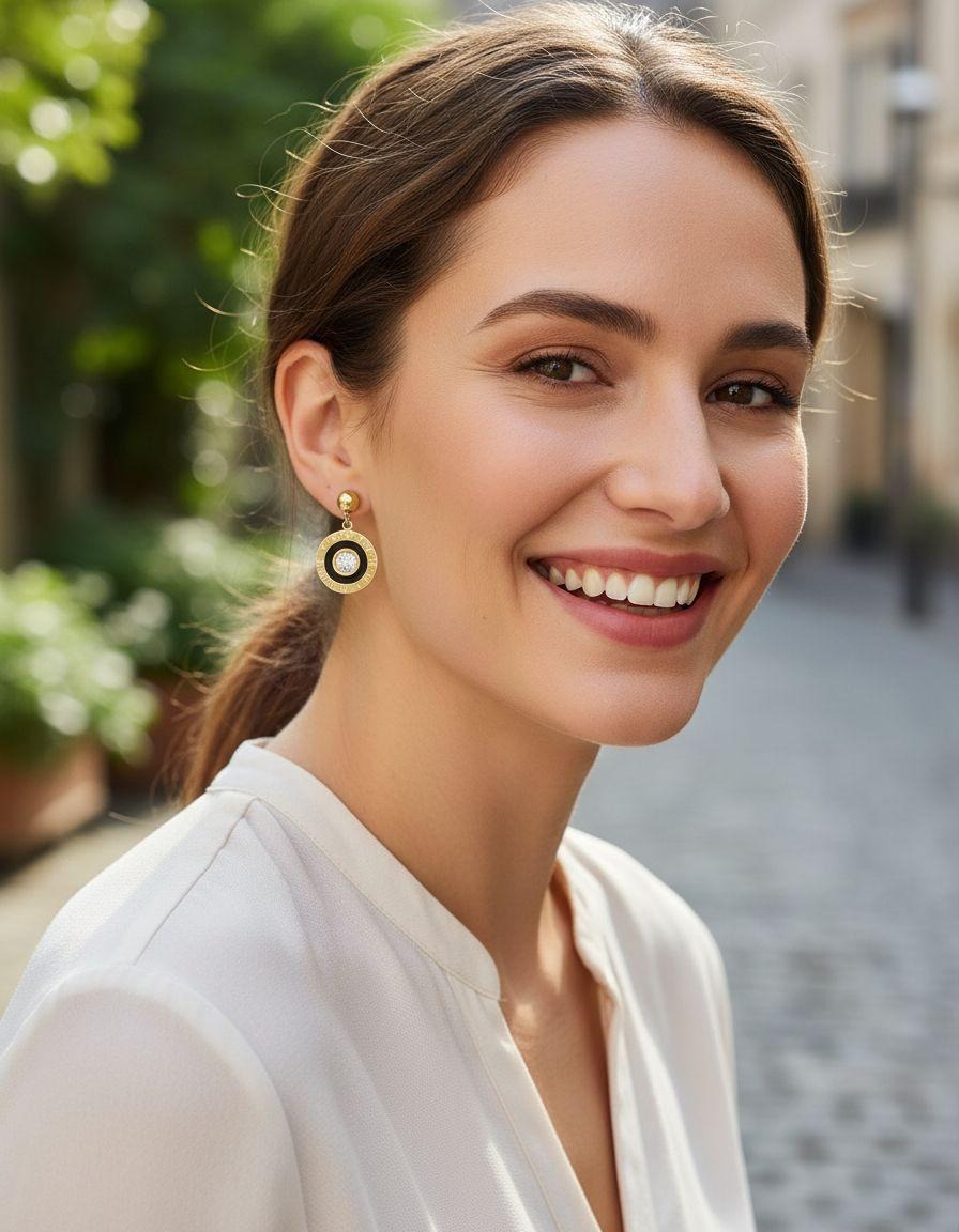 BOUCLES D'OREILLES EN ACIER DORE ROND CHIFFRES ROMAINS CERCLE NOIR ET STRASS