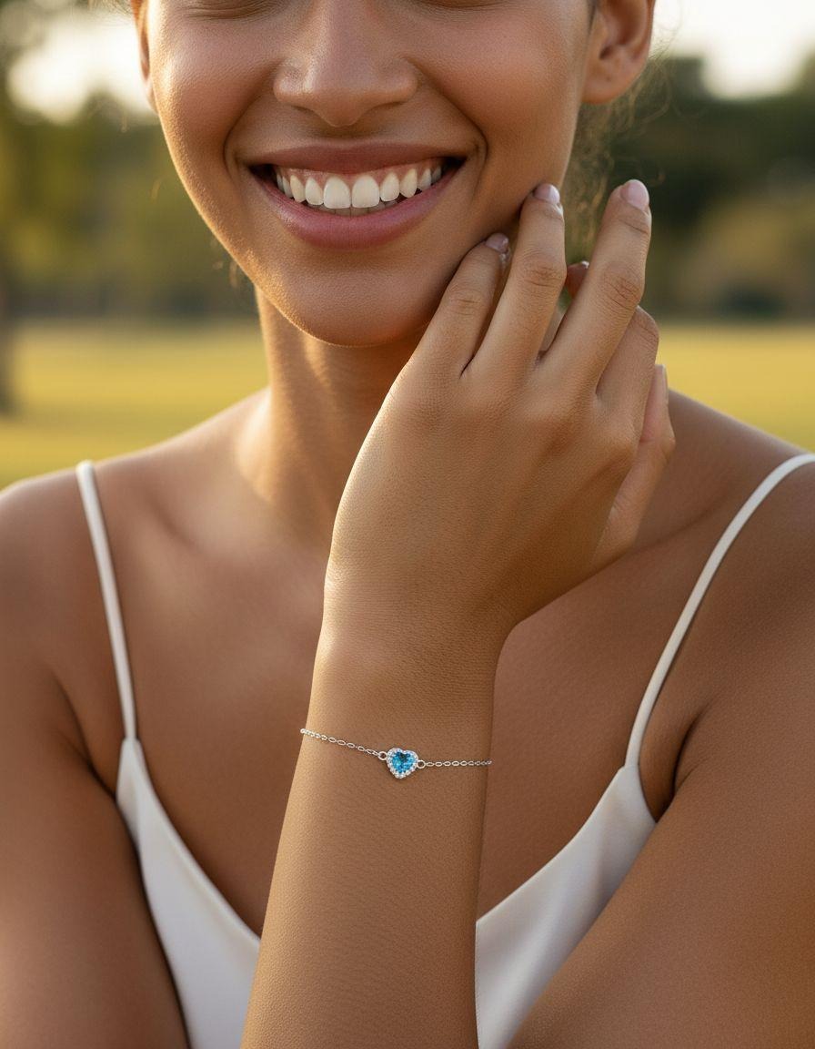 BRACELET EN ARGENT COEUR BLEU CLAIR AVEC PIERRES