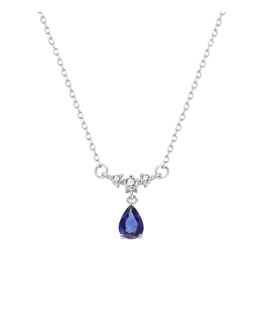 Collier en argent motif fantaisie avec pierre bleue pendante