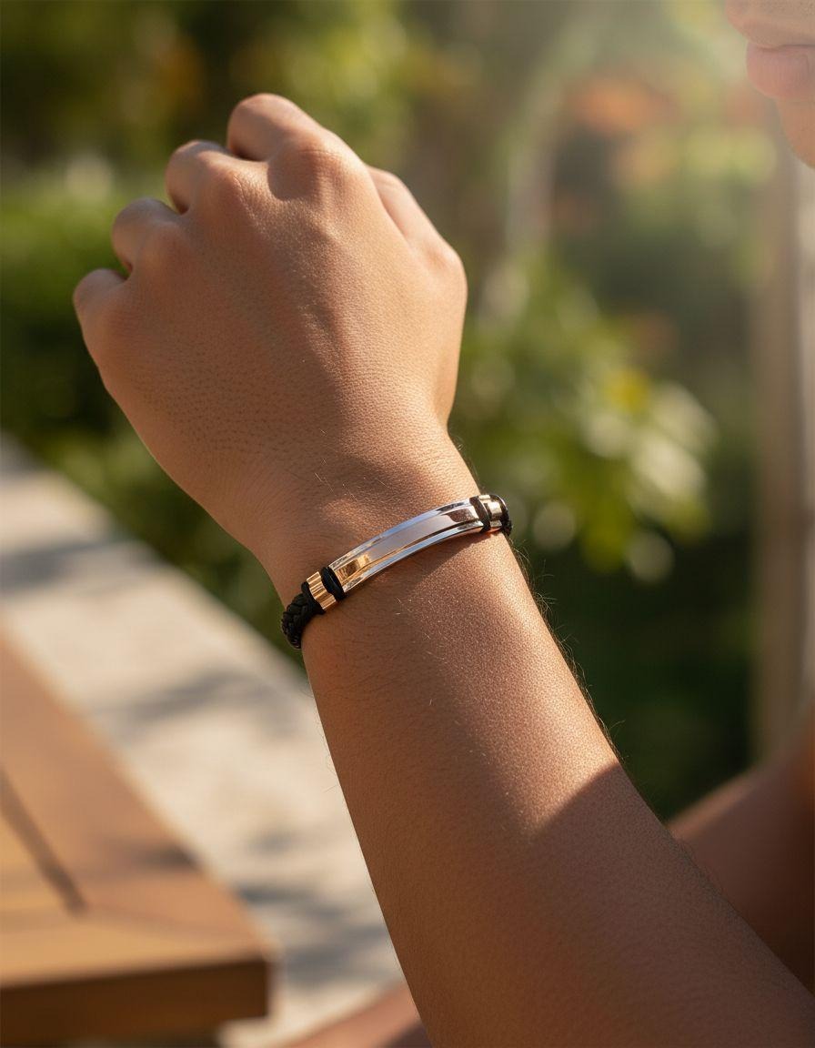 BRACELET EN CUIR TRESSE AVEC PLAQUE BICOLORE