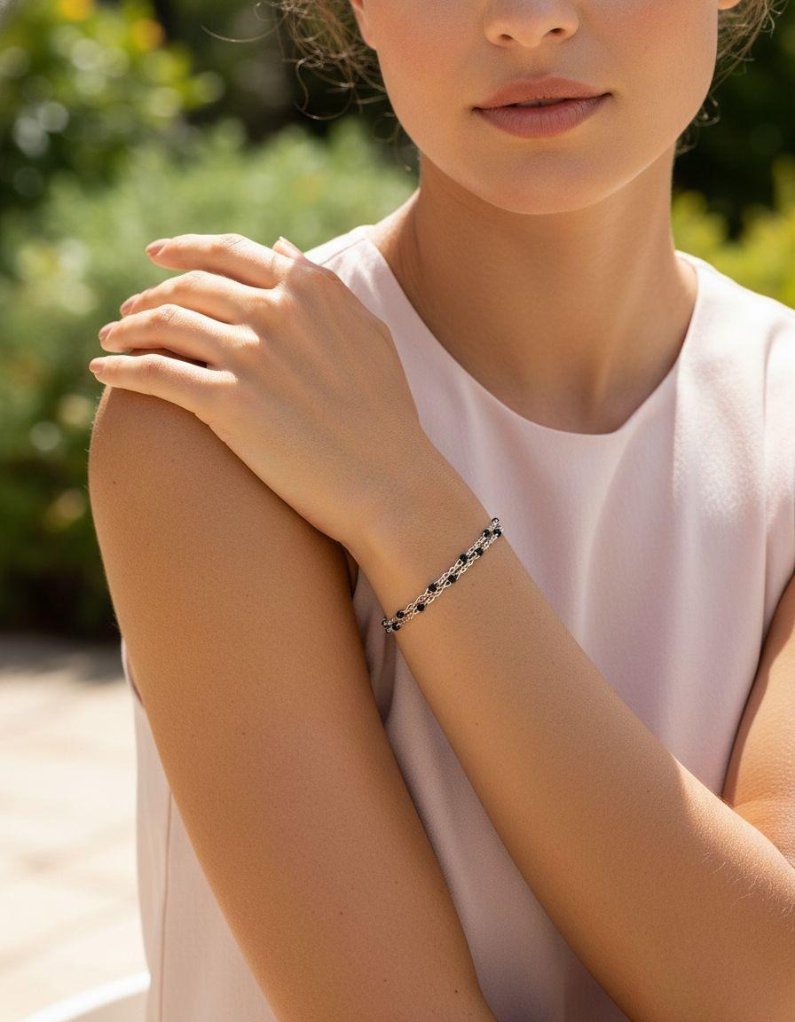 BRACELET EN ACIER DOUBLE MAILLE AVEC BILLES NOIRES