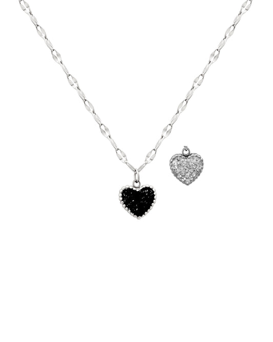 Collier en acier avec pendentif coeur reversible strass noir et blanc