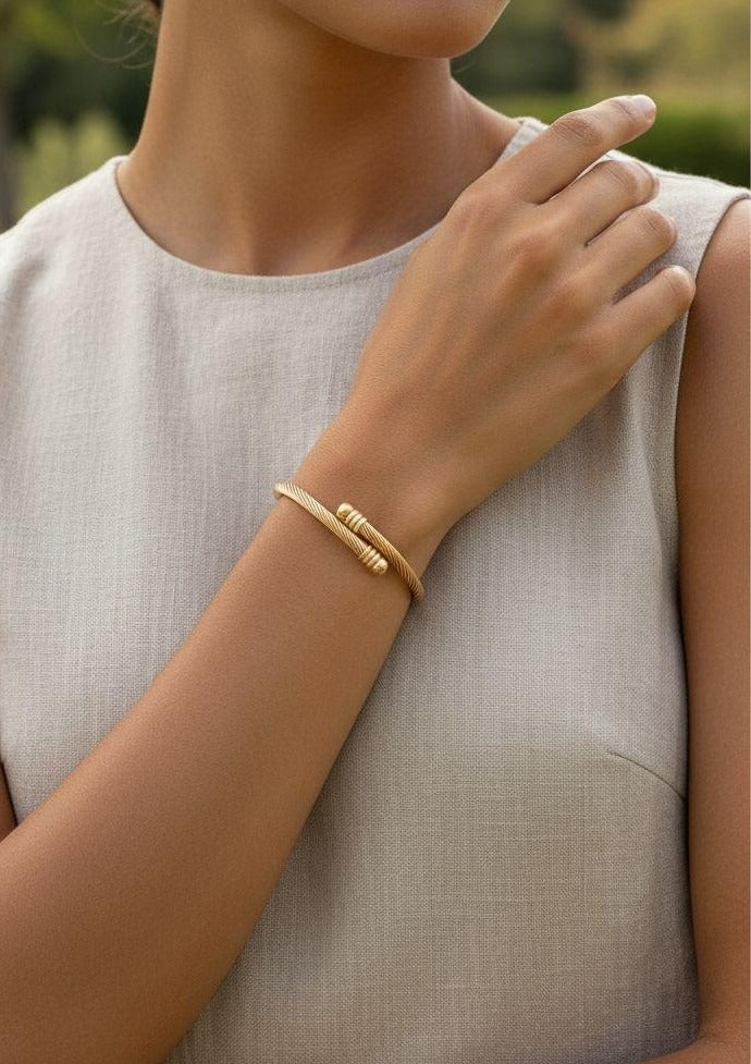 BRACELET EN ACIER DORE CABLE