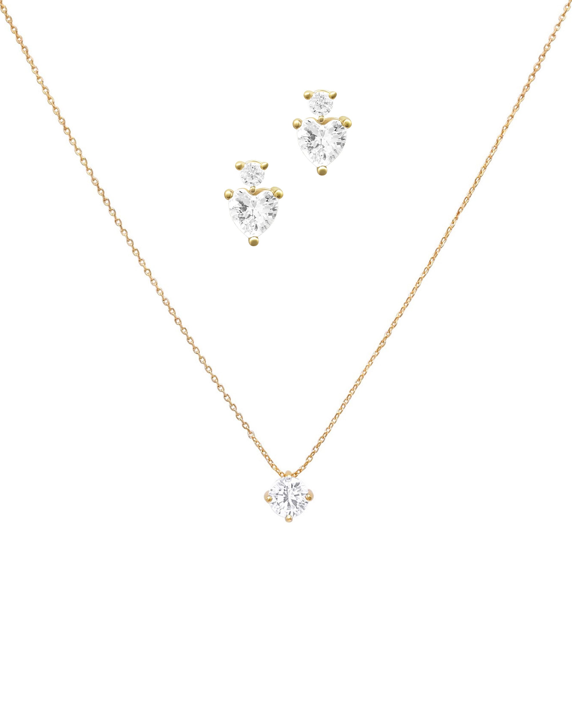 PARURE EN PLAQUE OR SOLITAIRE ET ZIRCONIUM