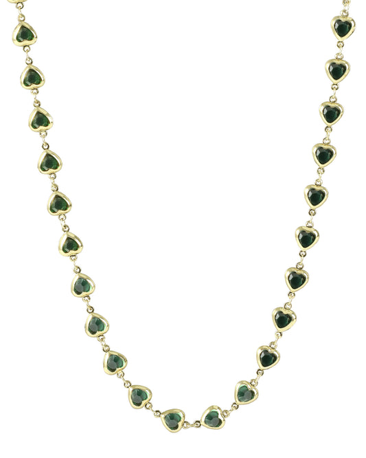 Collier en acier doré avec coeur émeraude