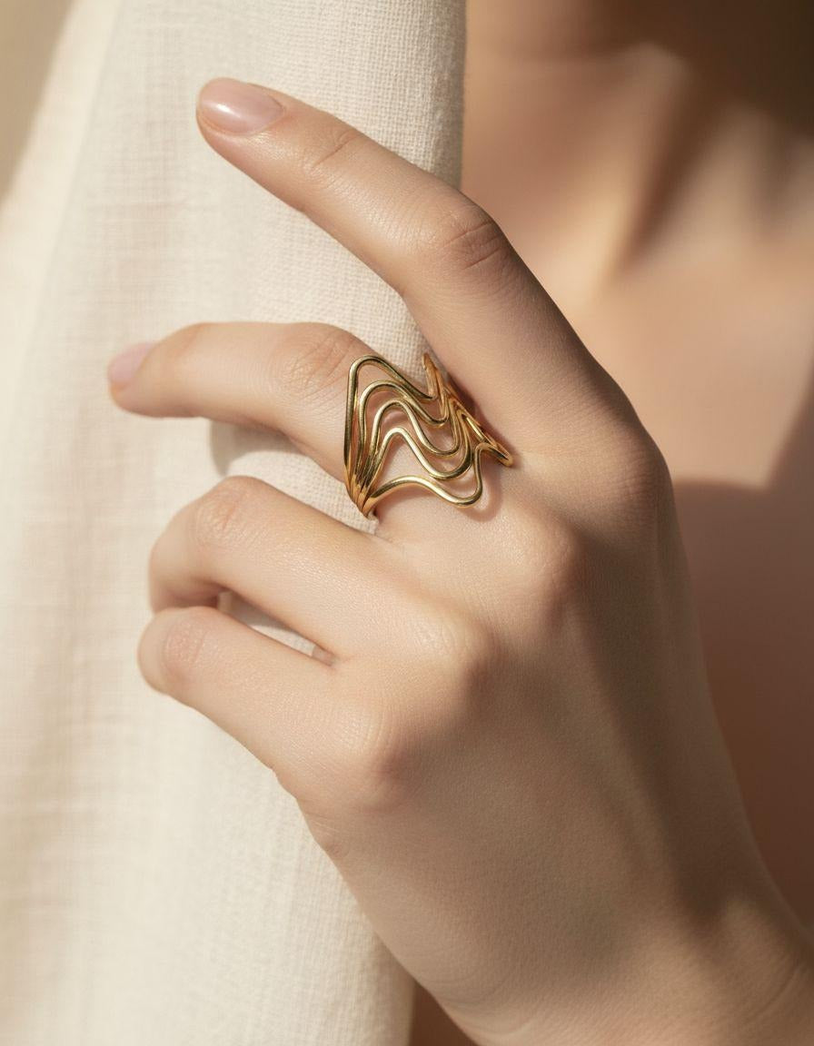 BAGUE EN ACIER DORÉ INSPIRATION VAGUES