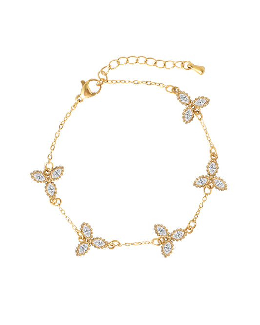 Gold-plated steel bracelet with white floral motif