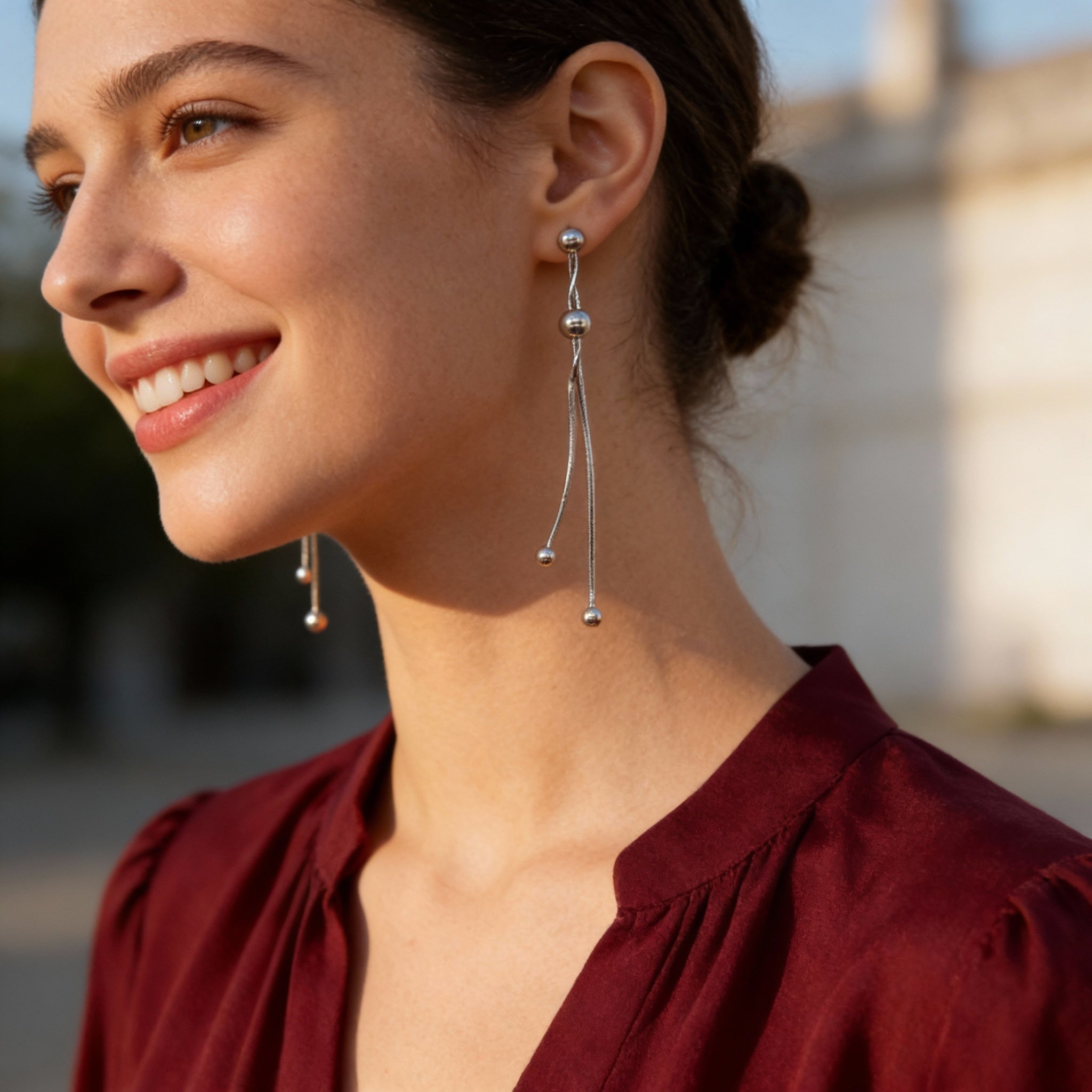 ZILVEREN OORBELLEN MET BUNDELENDE NETJES EN BALLEN