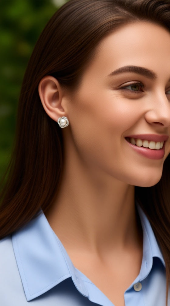 Zilveren bloemenoorbellen met stenen en parel