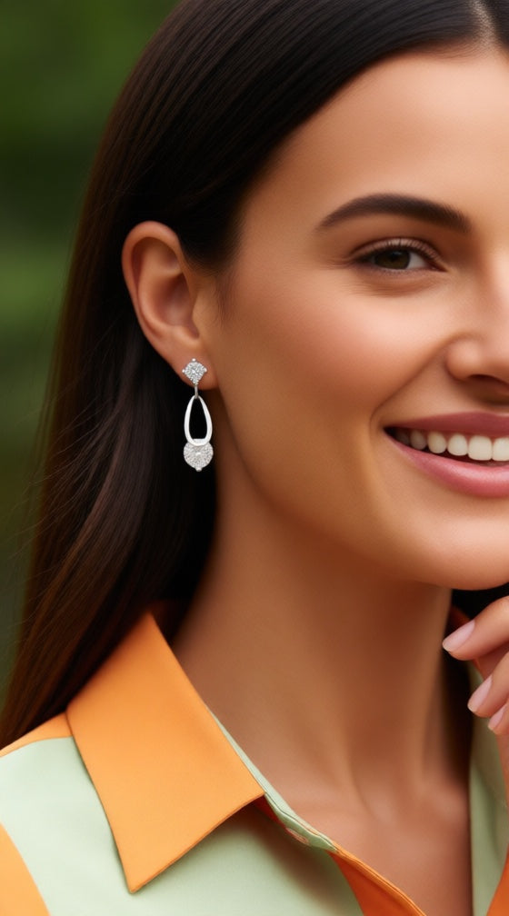 Zilveren druppel- en solitaire oorbellen