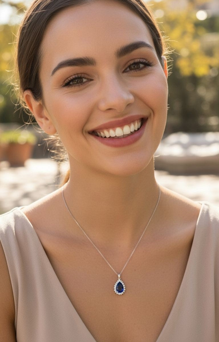 ZILVEREN KETTING MET BLAUWE DRUPPELS HANGER