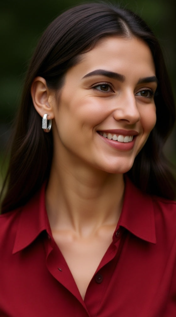 Achthoekige zilveren creolen bezet met stenen