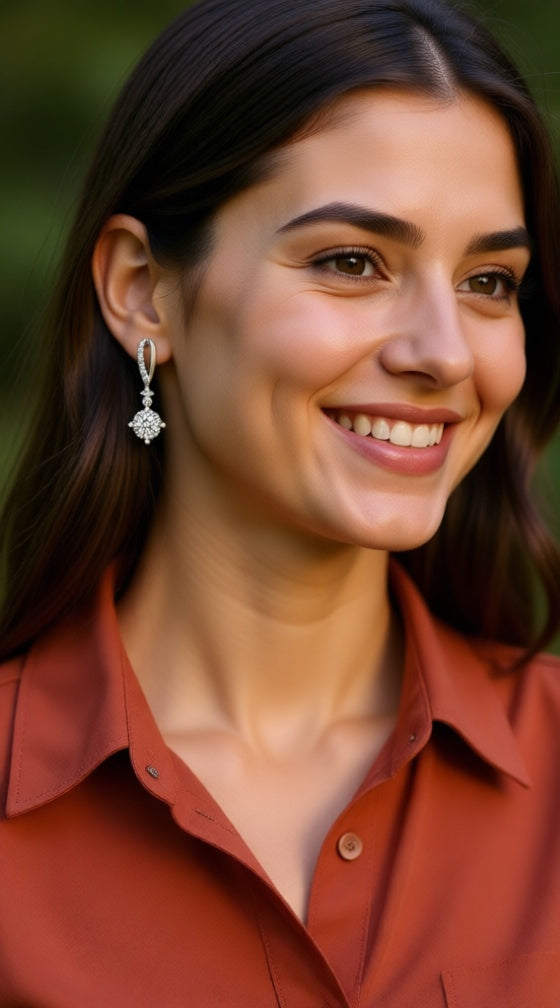 Zilveren traanvormige oorbellen met stenen en solitaire