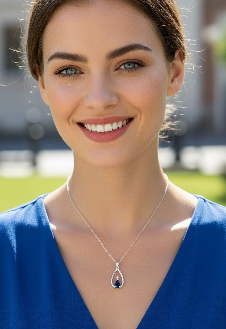 ZILVEREN KETTING MET HANGER EN BLAUWE STEEN