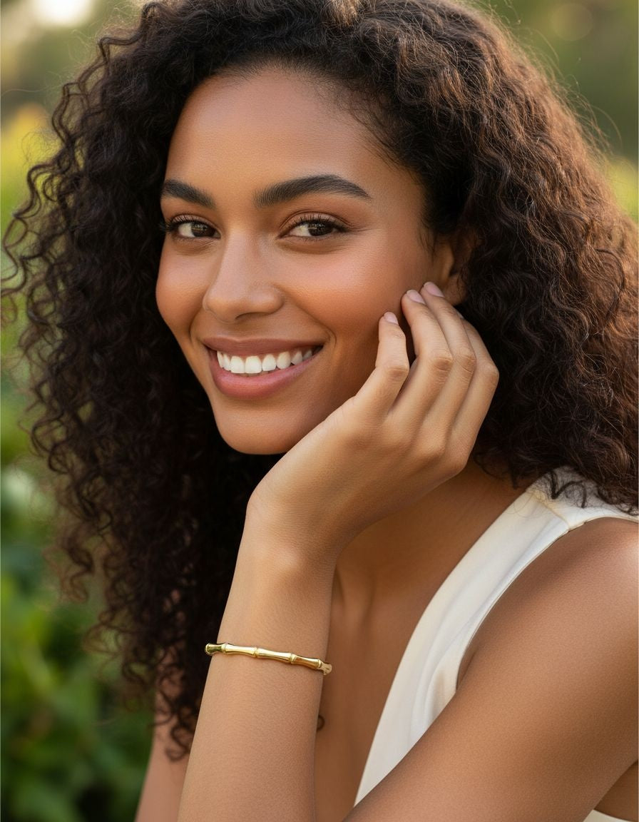 BRACELET EN ACIER DORE RIGIDE EFFET BAMBOU