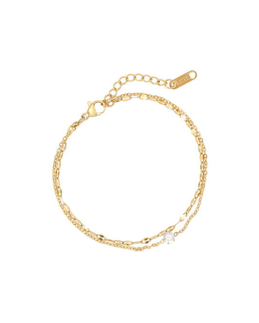Bracelet en acier doré double maille avec solitaire