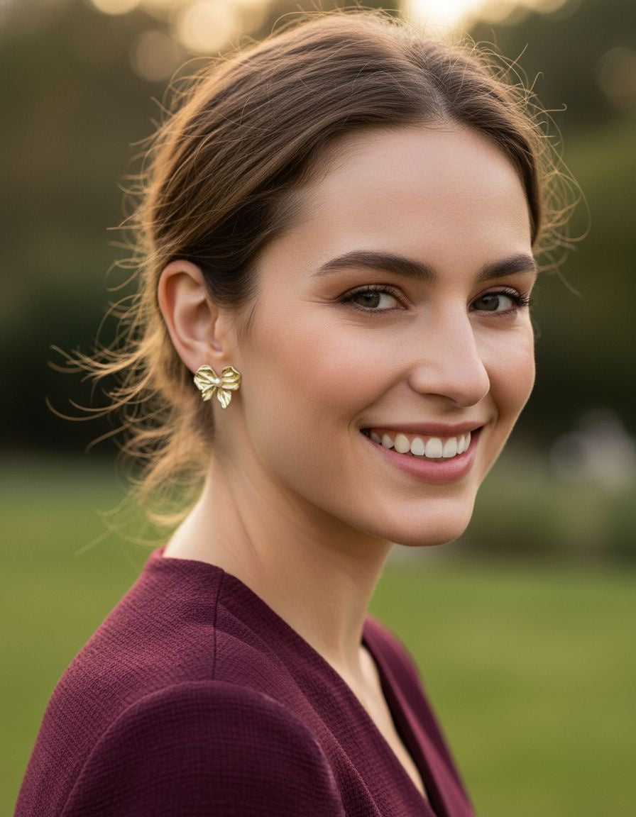 BOUCLES D'OREILLES MOTIF NOEUD AVEC PERLE