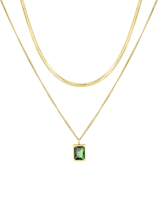 Collier en acier doré double chaîne avec pendentif solitaire émeraude
