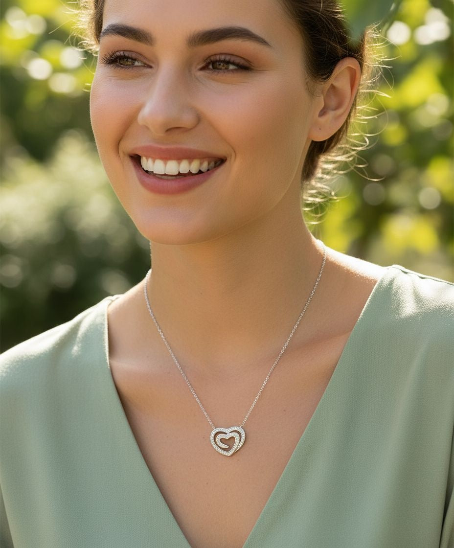 COLLIER EN ACIER PENDENTIF COEUR AVEC STRASS