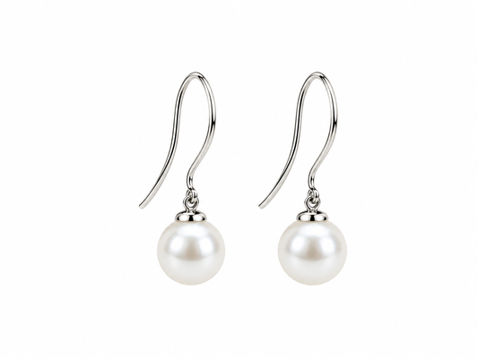 Boucles d’oreilles pendantes argentées avec perles de Majorque blanches