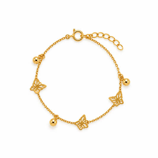 Bracelet en acier doré avec charms papillons et perles