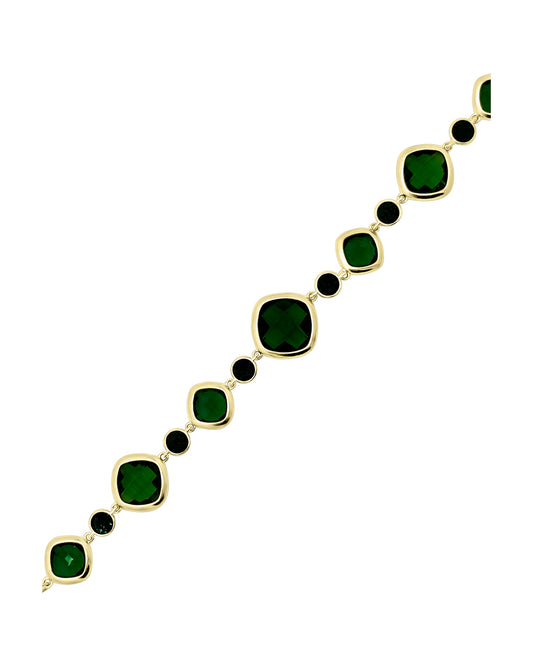 Bracelet en acier doré avec pierres émeraude facettées