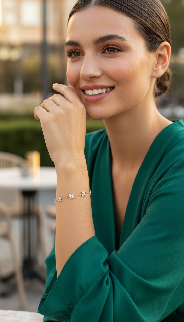 VERGULDE ARMBAND MET ZIRKONIUM VLINDERS