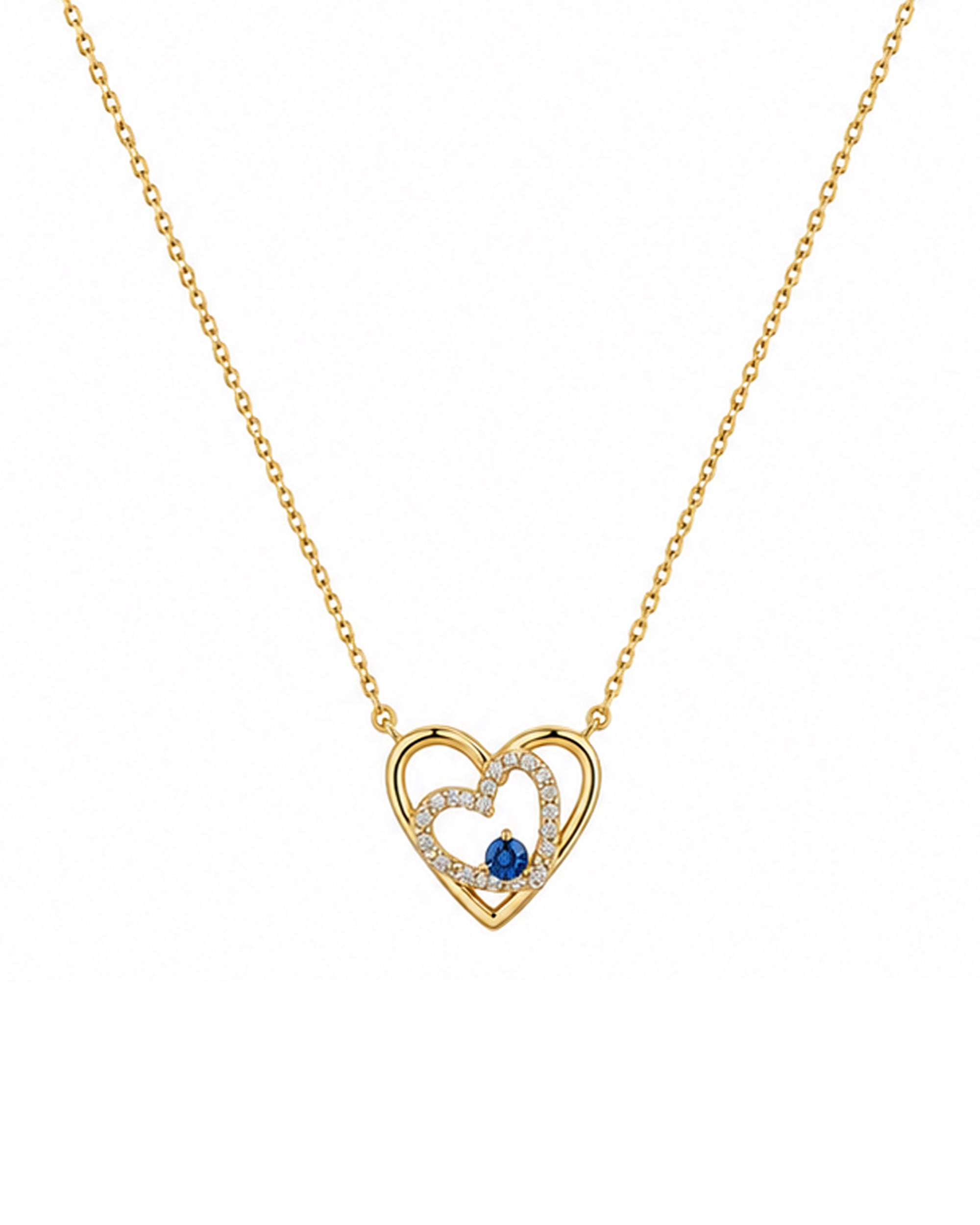 COLLIER EN PLAQUE OR DOUBLE COEURS ENTRELACE AVEC ZIRCONIUM ET SOLITAIRE LIGHT BLUE