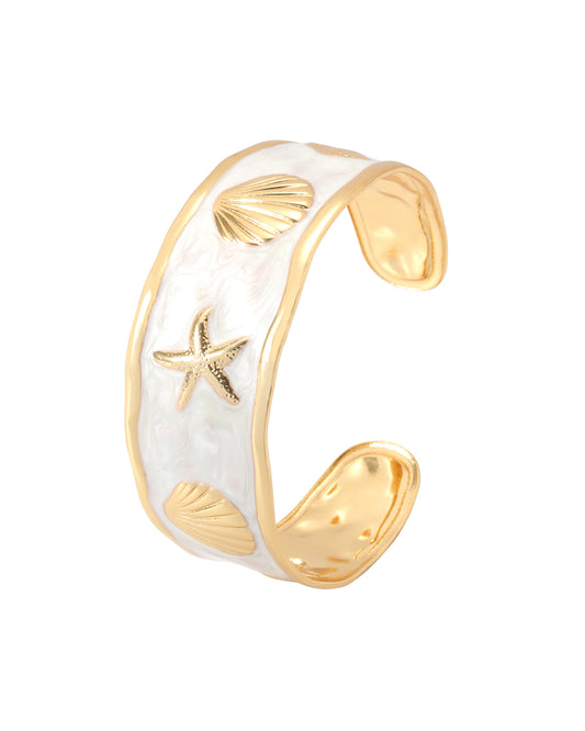 Bracelet jonc en acier doré nacre avec coquillages et étoiles