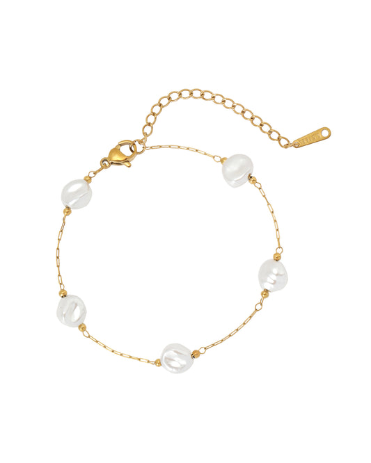 Bracelet en acier doré avec perle baroque