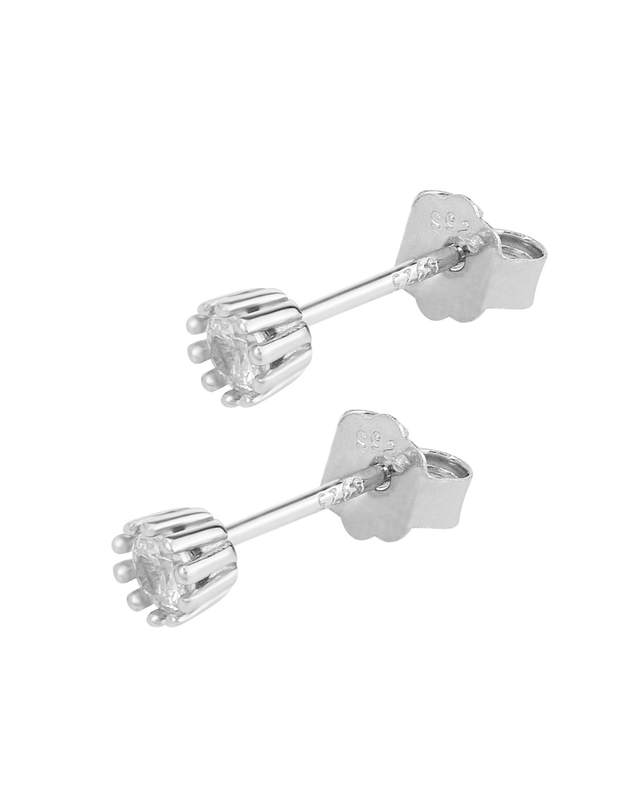 Boucles d'oreilles en argent massif solitaire sur 10 griffes