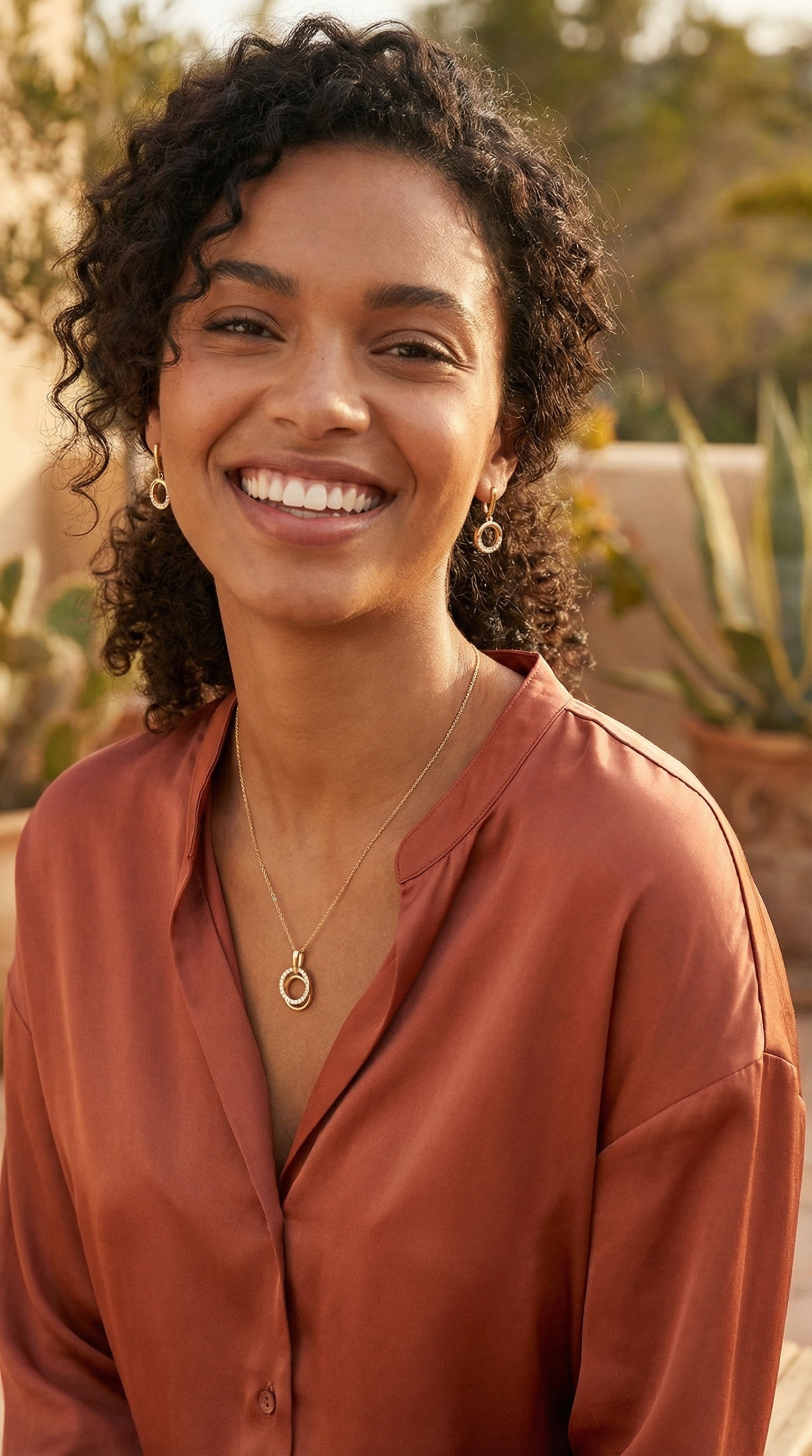 PARURE EN PLAQUE OR DOUBLE CERCLE AVEC ZIRCONIUM