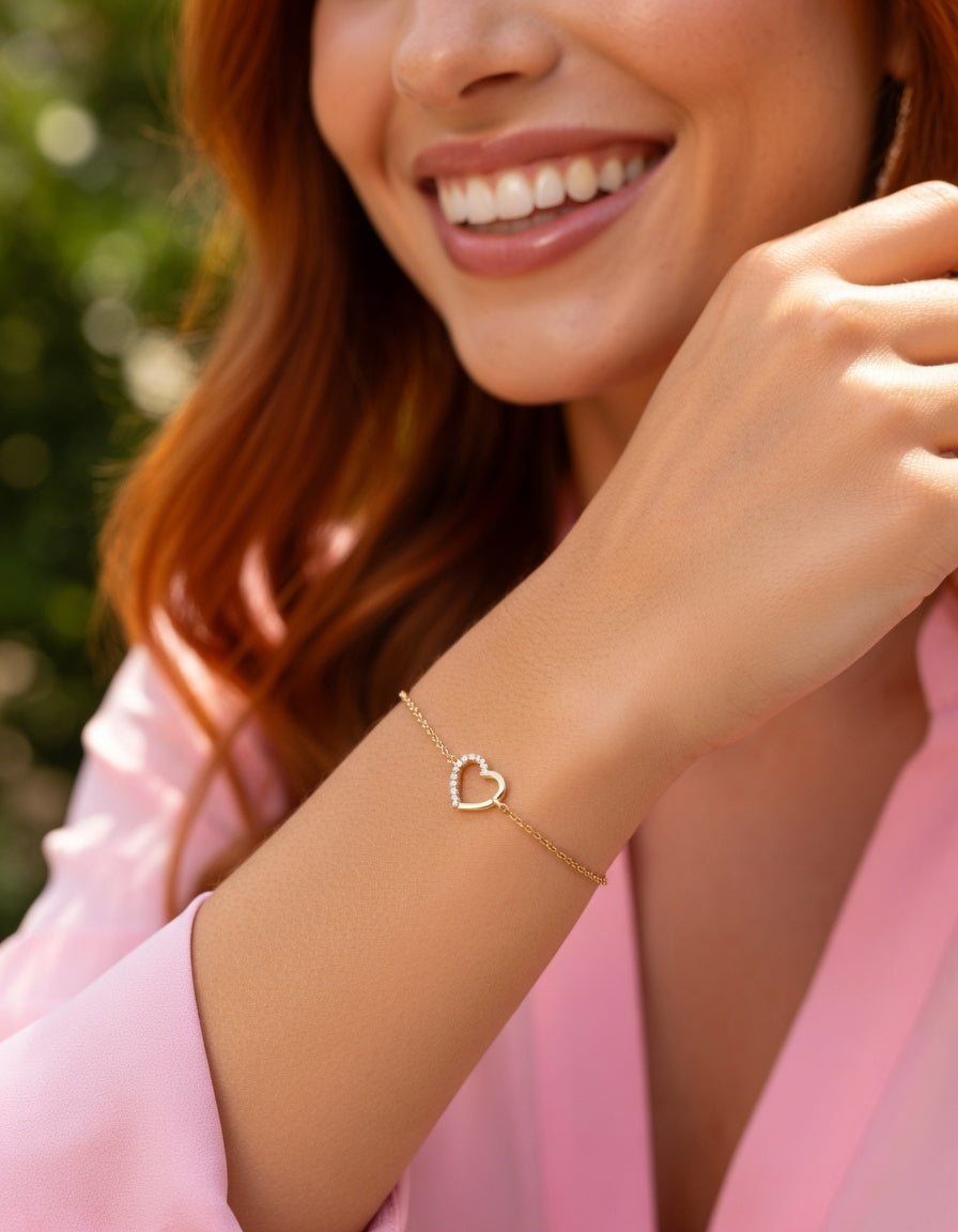 BRACELET EN PLAQUE OR AVEC COEUR DEMI ZIRCONIUM